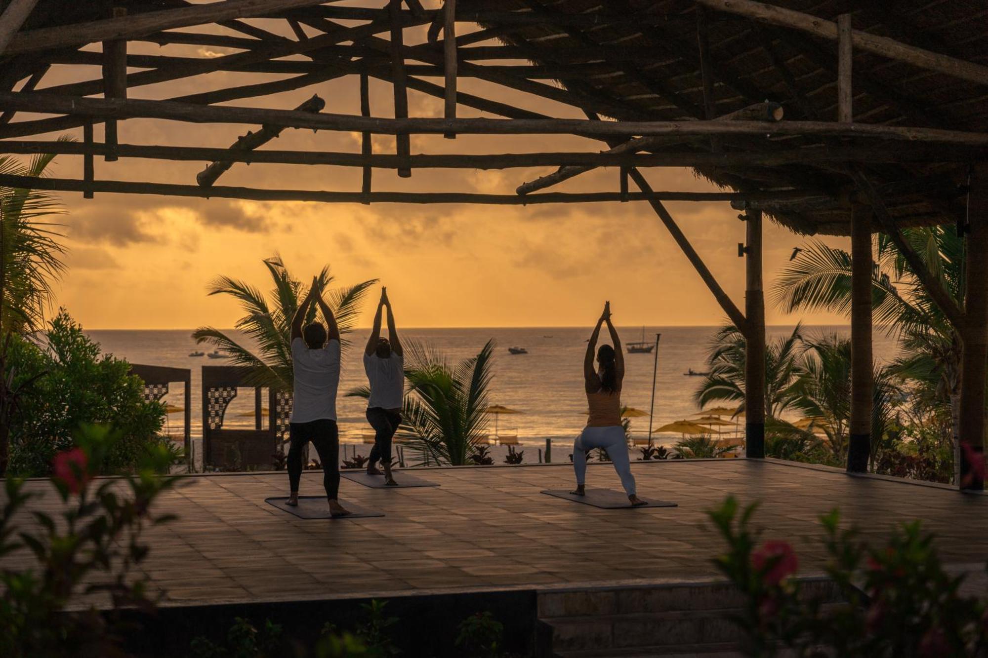 Hotel The Mora Zanzibar Matemwe  Zewnętrze zdjęcie Sunset yoga at the beach